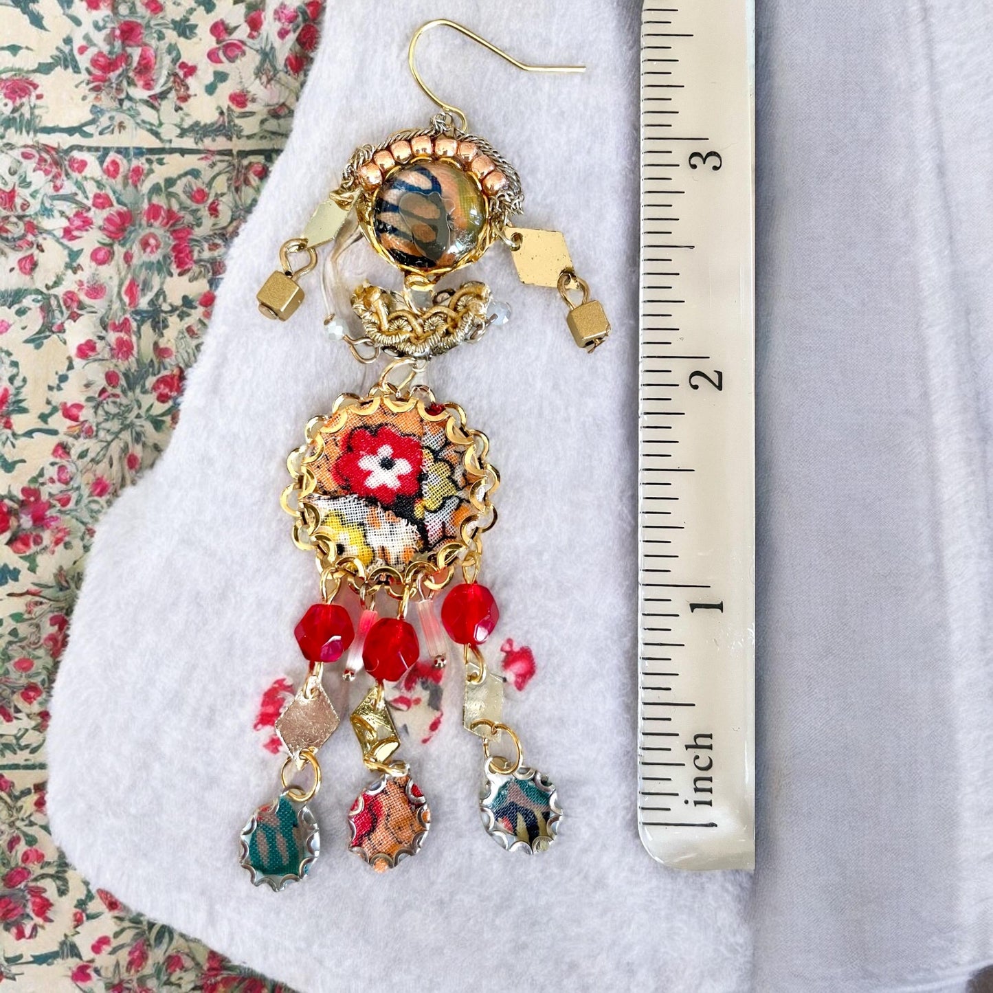 Handmade collage earrings featuring vintage textiles, crystal glass, mixed metals and various unique findings. Sterling silver ear wires.