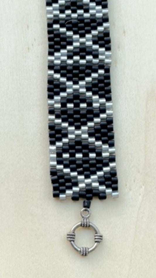 Stunning vintage silver and black hand woven vintage beadwork bracelet