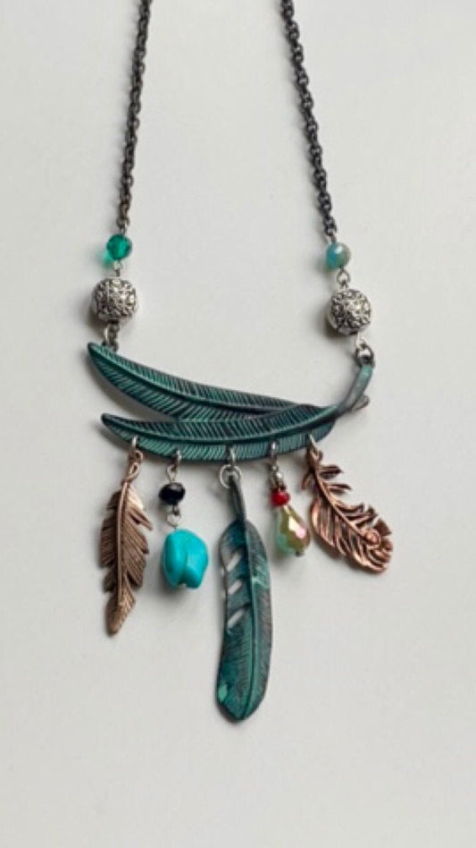 Mixed material feather and charm vintage artisan necklace