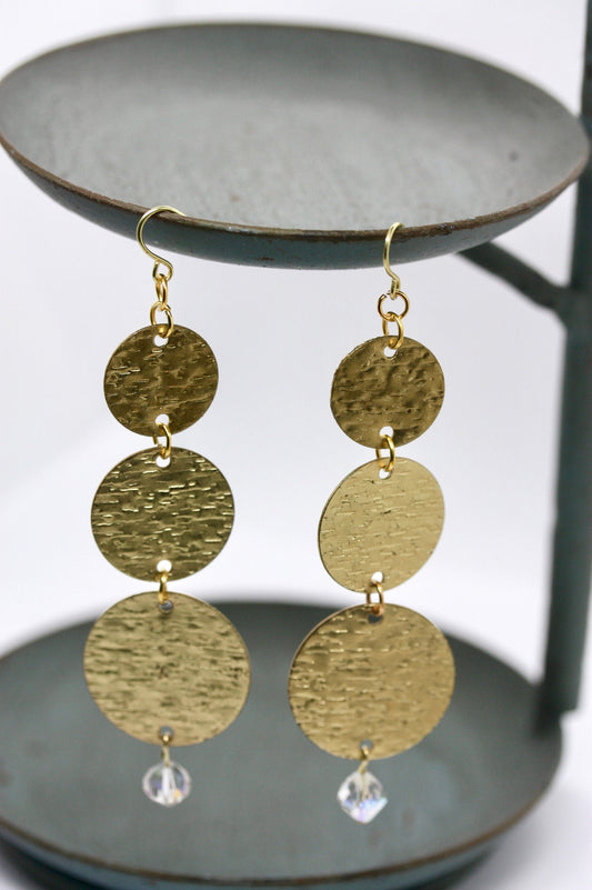 Textured gold round double-dangle earrings with crystal drop