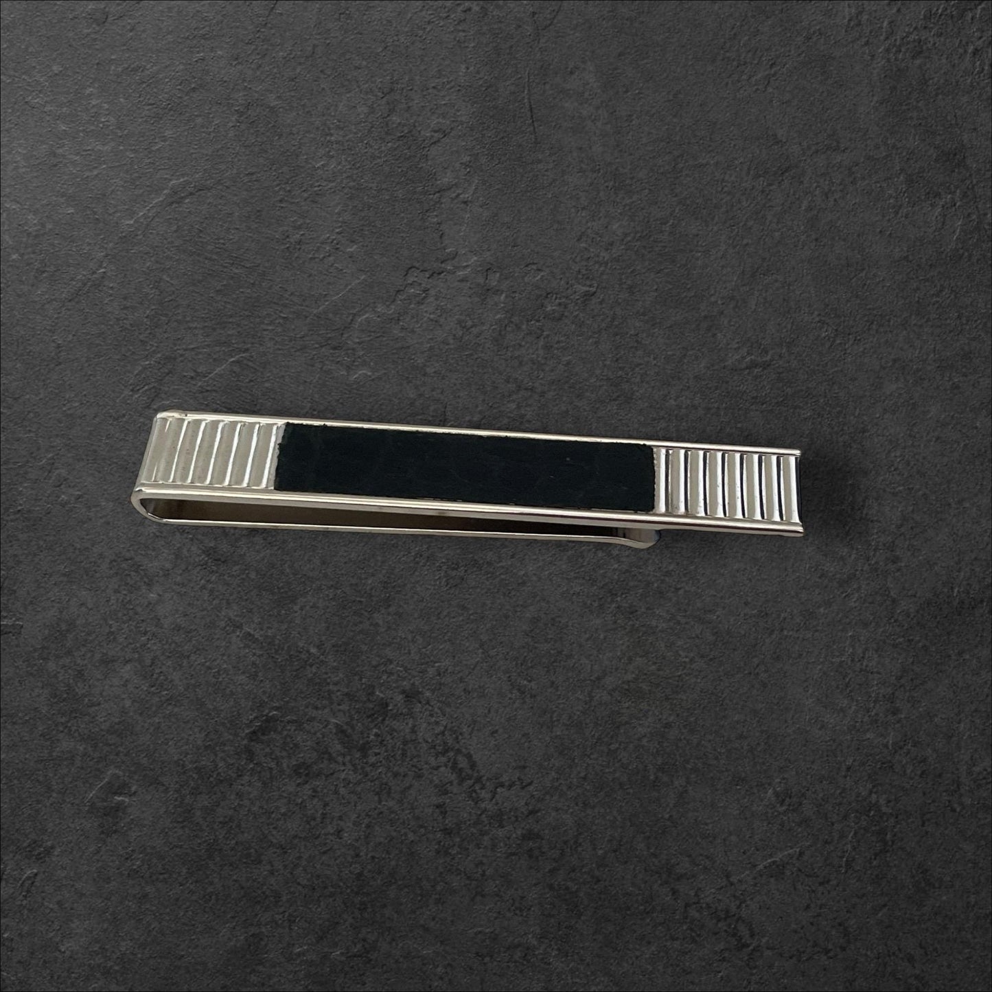 Black and silver mens tie clip - signed Swank