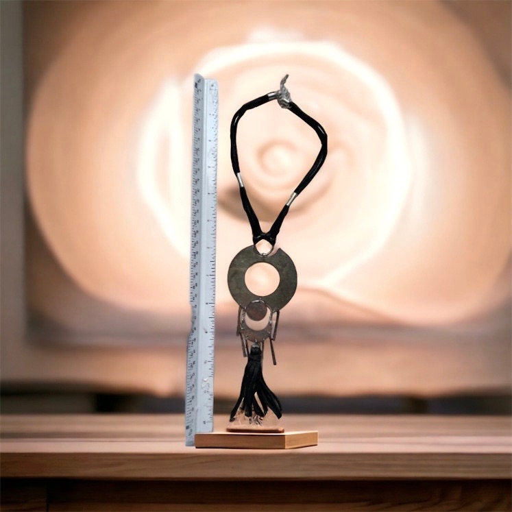 Unique vintage necklace with black suede and silvertone metal