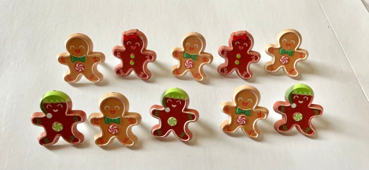 Mix of gingerbread men and women plastic ring cake toppers