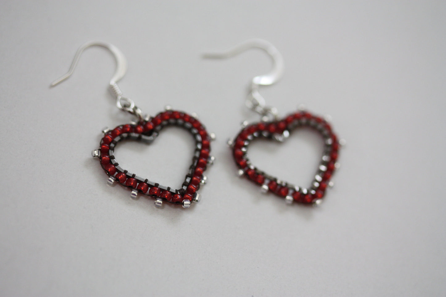 Small intricately beaded heart dangle earrings - original beadwork