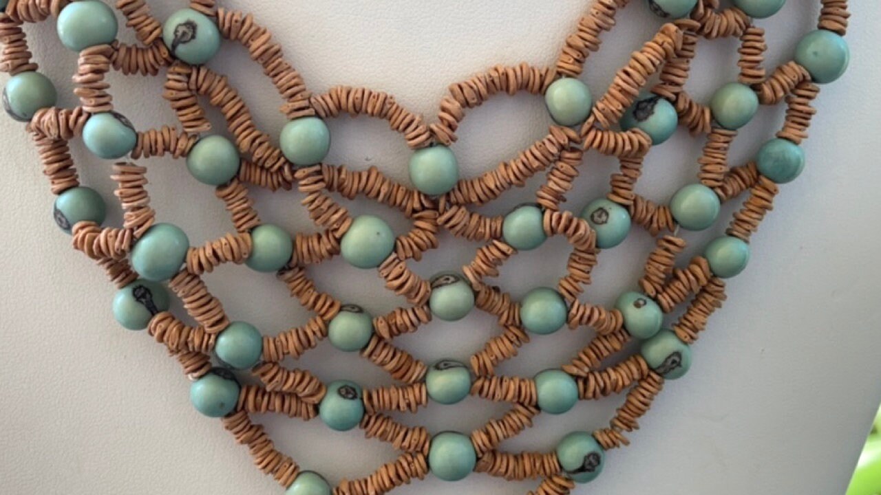 Unique vintage heishi bead and turquoise bead bib style necklace