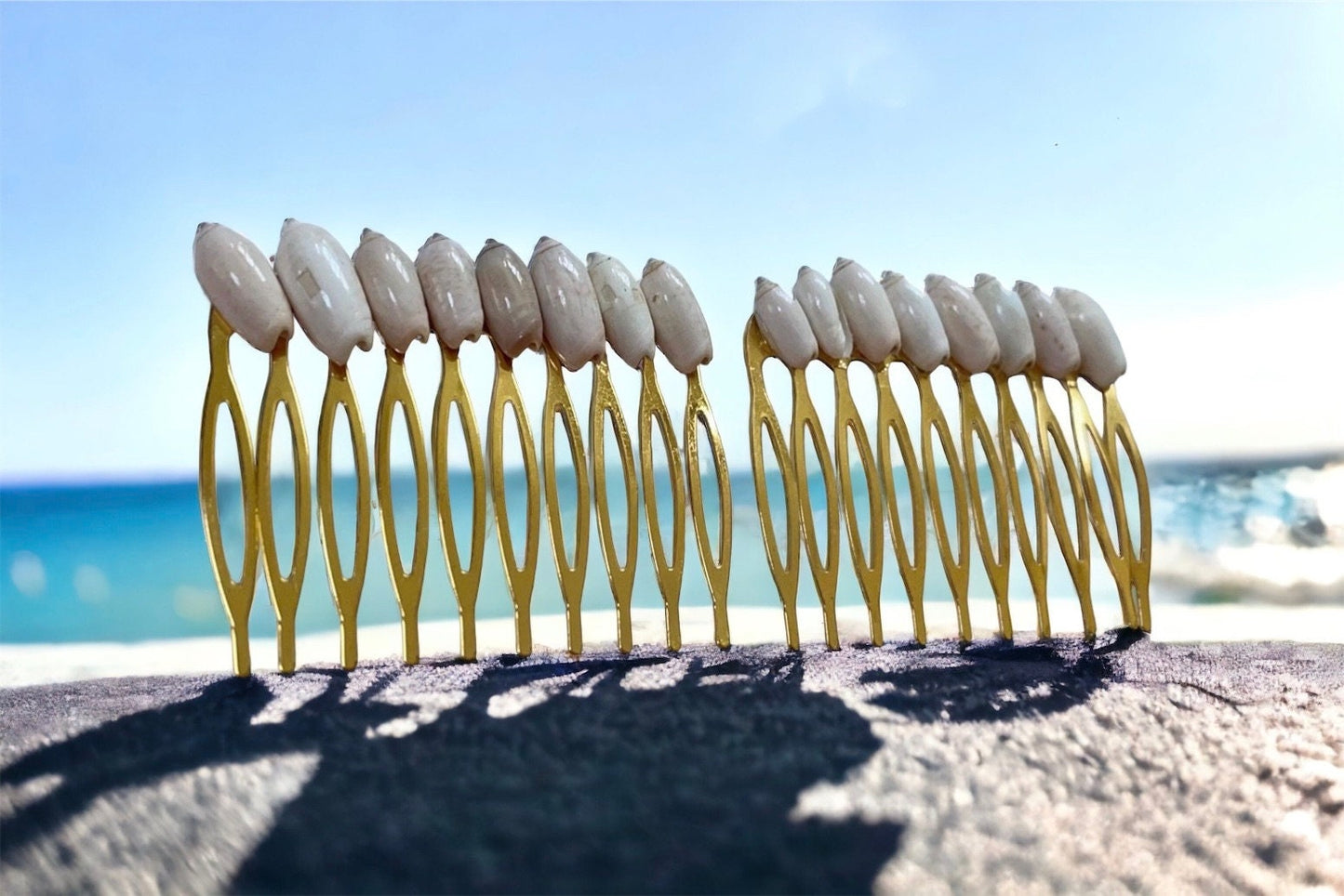 Stunning goldtone hair comb with white shells