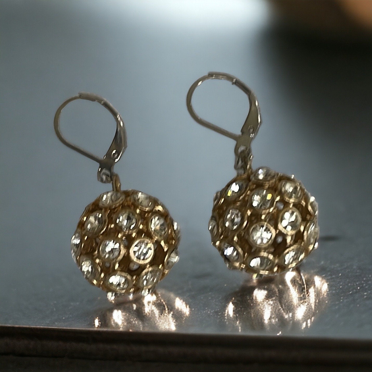 Inlaid rhinestone studded gold ball earrings