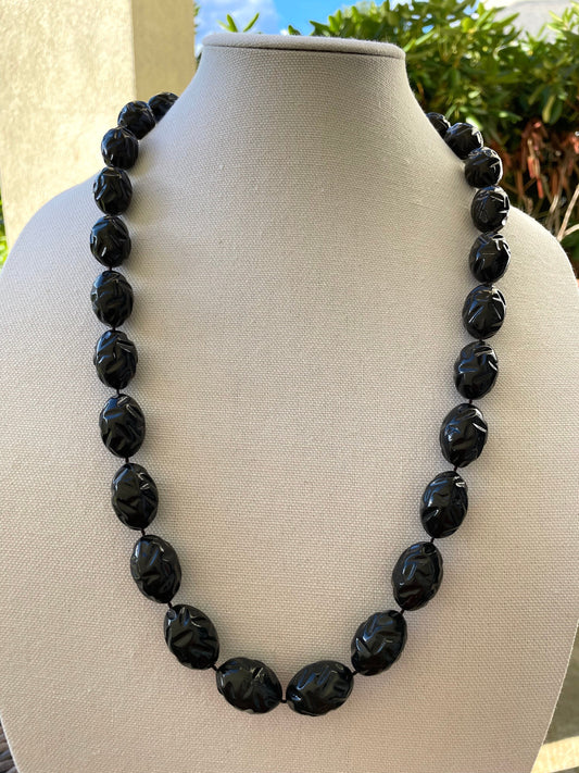 Simple black vintage necklace with uniquely shaped black beads