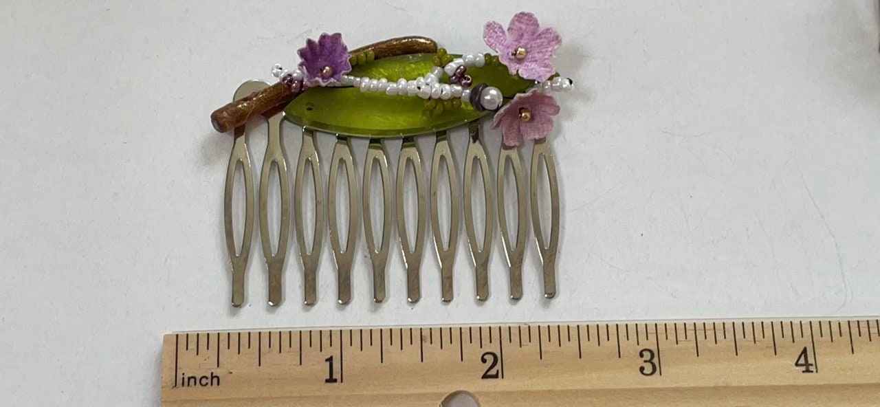 Mixed material hair comb - one-of-a-kind handmade beadwork with upcycled vintage fabric flowers, green "leaf" and branch