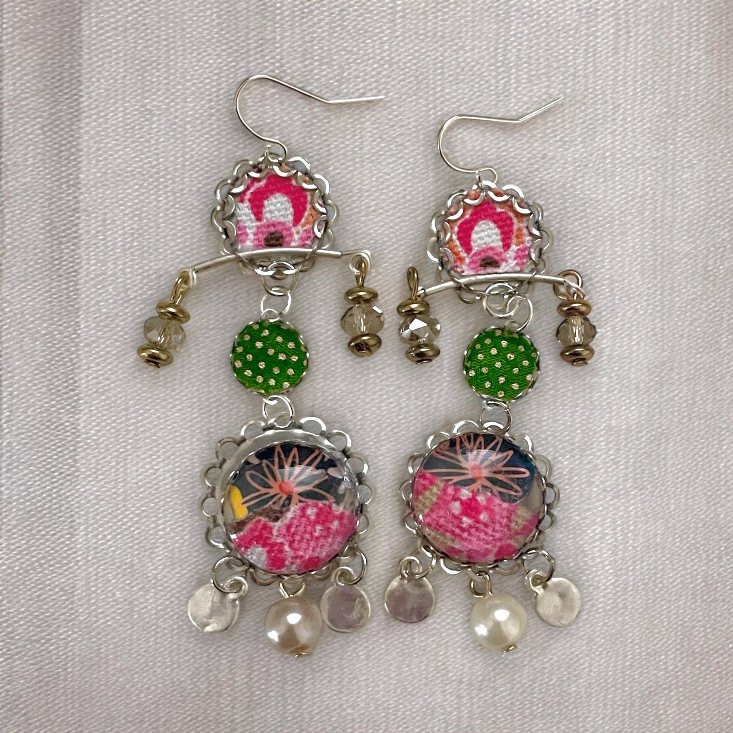 Handmade mixed media earrings made with fabric, paper, hammered metal, mixed metals, crystals and faux pearls.  Sterling ear wires.