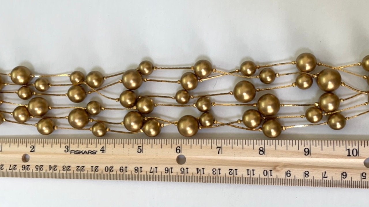 Stunning vintage multi strand goldtone faux pearl necklace