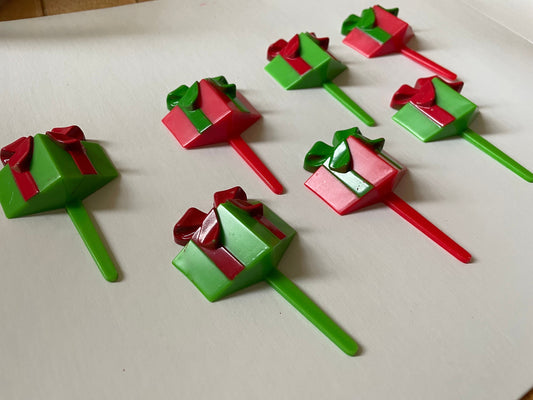 One dozen christmas cupcake toppers - Mix of red and green 3D plastic cake toppers - little wrapped packages with bows