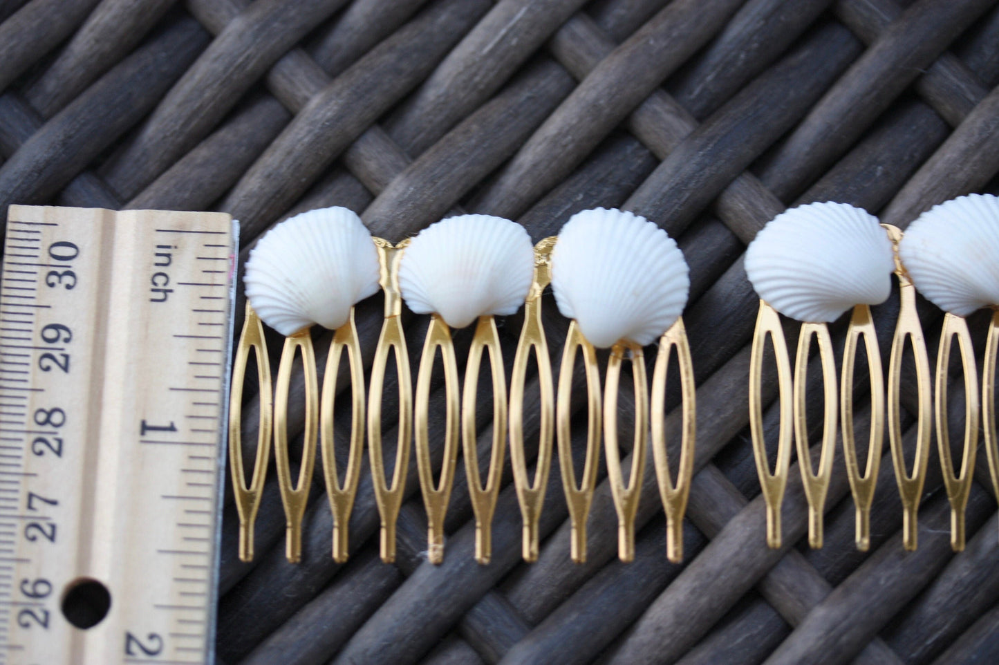 Stunning goldtone hair comb with white shells