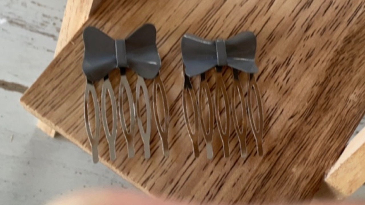 Pair of gray bows mini metal hair combs - 1" each