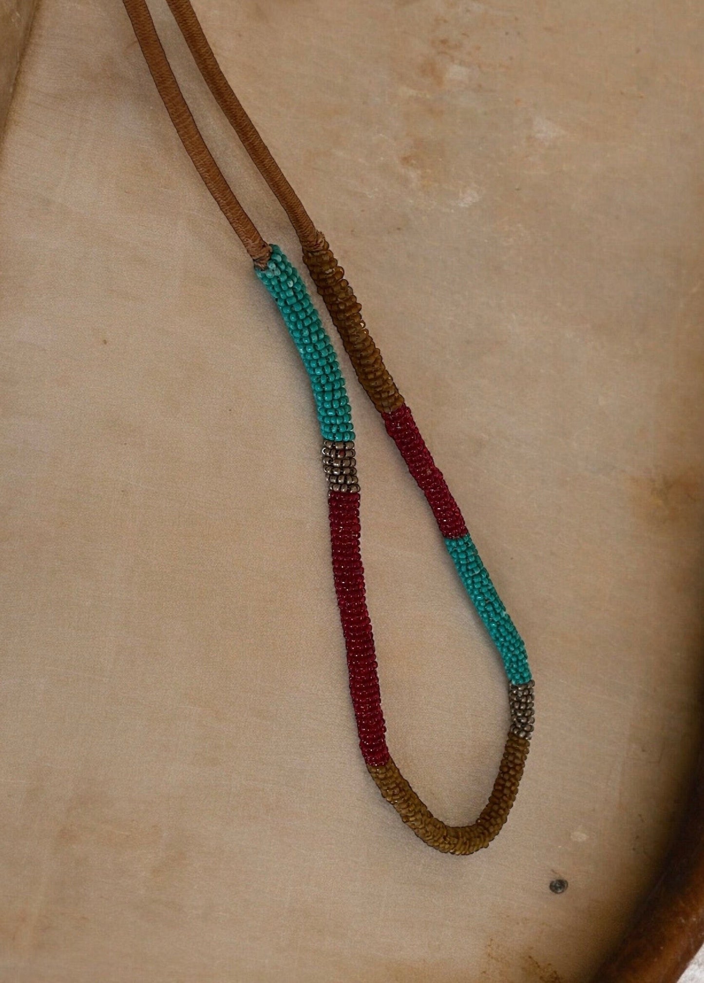 Stunning silk wrapped earth tone beaded long vintage necklace