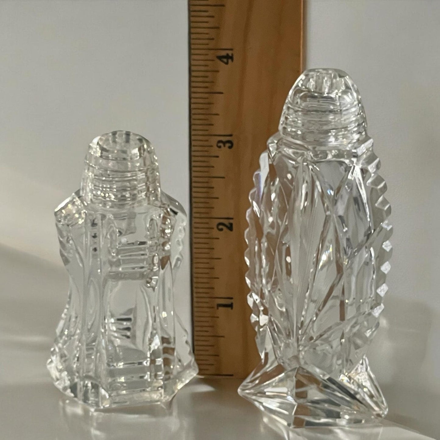 Pair of thick cut crystal vintage salt shakers