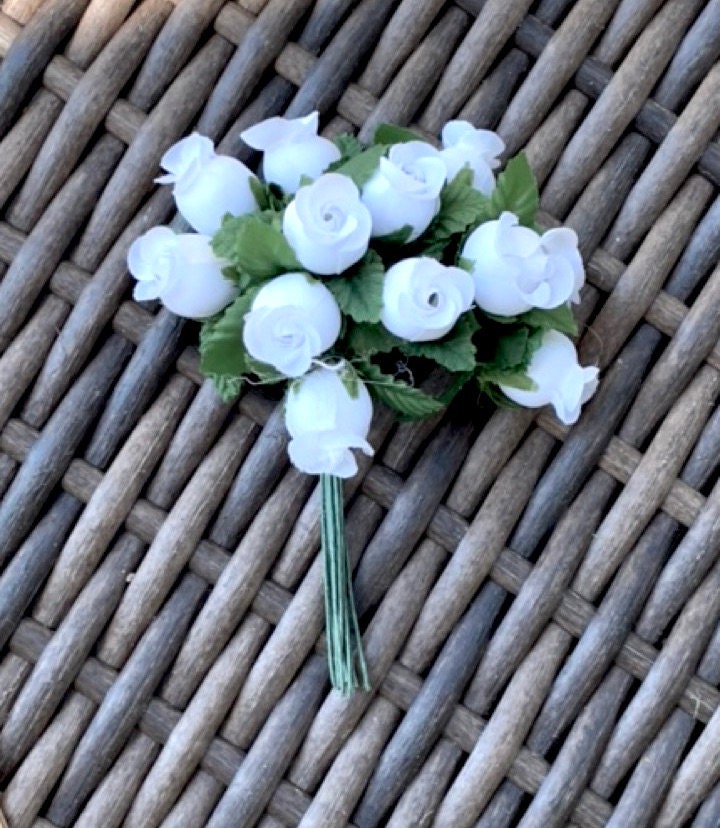 Three dozen (36) individually wire stemmed faux flowers - available in 3 colors - blue, yellow or white