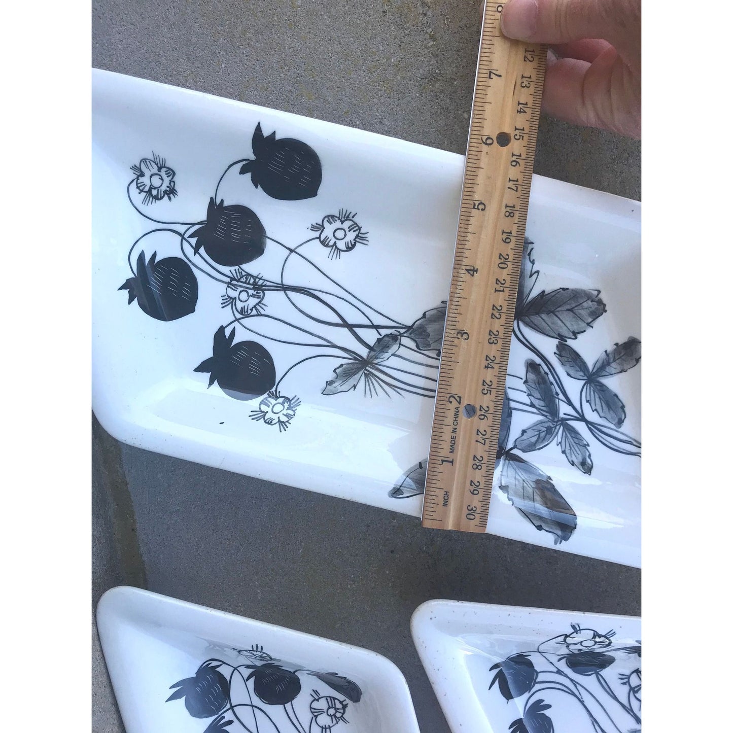 5-piece set of uniquely shaped black and white dishes - numbered and signed "Made in Italy" - needs a little TLC