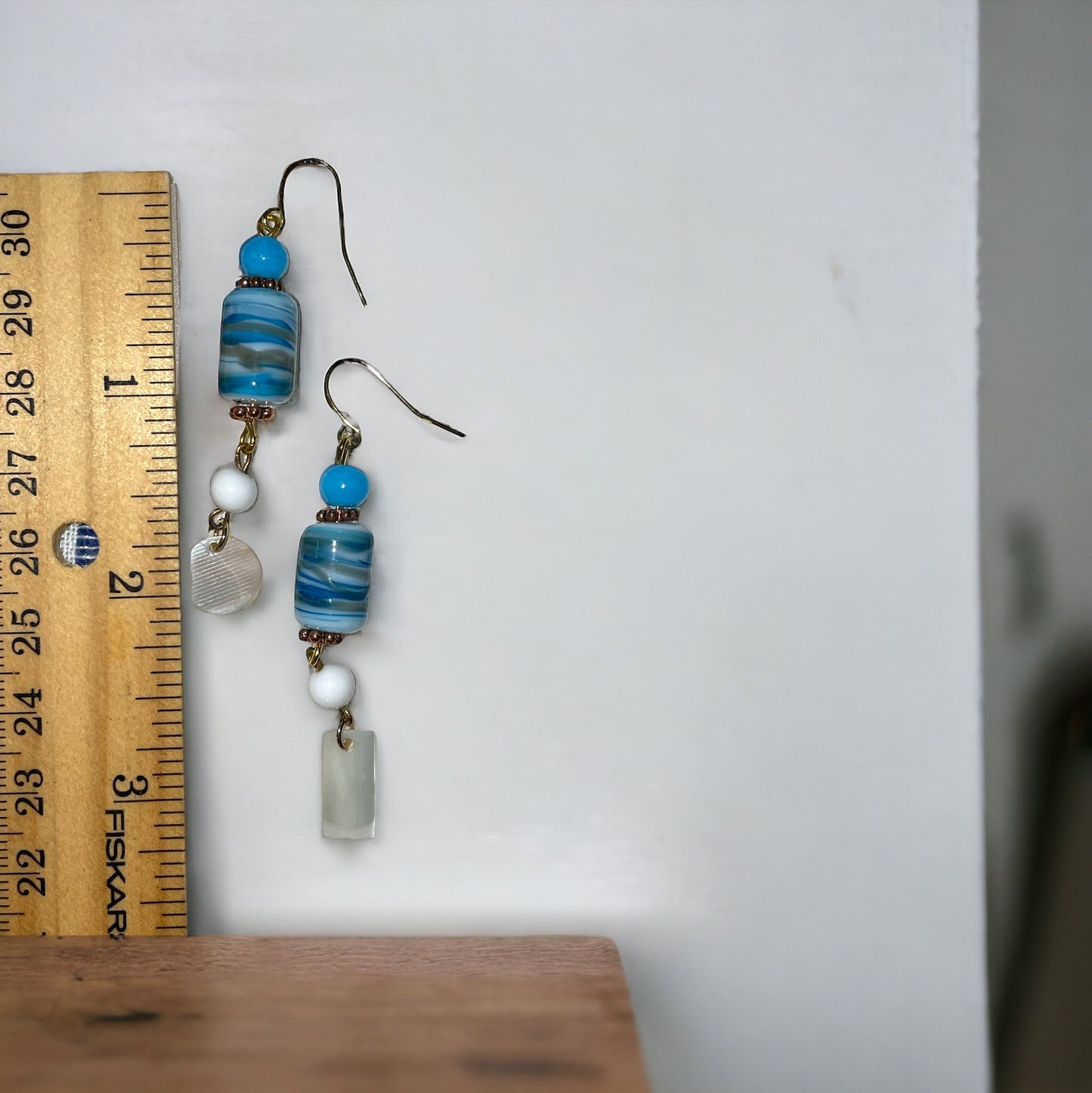 Shades of blue swirled glass with mother of pearl dangles - handmade earrings