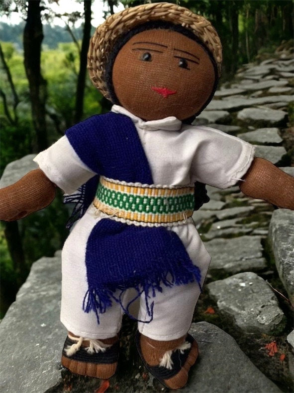 Stunning vintage Mexican girl doll with braids and authentic clothing with straw hat