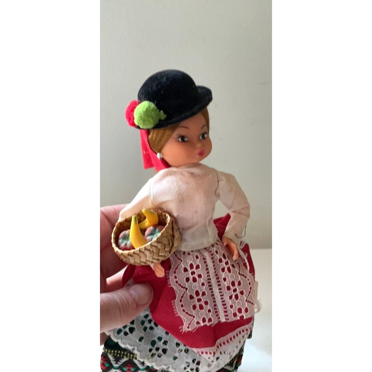 Vintage signed Muneca Artesana Beibi doll figurine - Made in Spain - holding wicker basket with miniature fruit