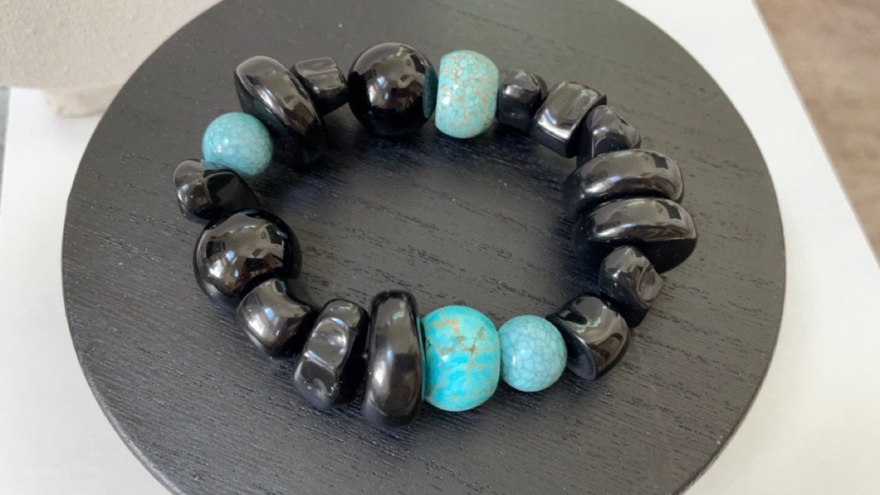 Stunning vintage mixed sizes and shapes of black and faux turquoise beaded bracelet