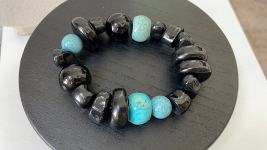 Stunning vintage mixed sizes and shapes of black and faux turquoise beaded bracelet