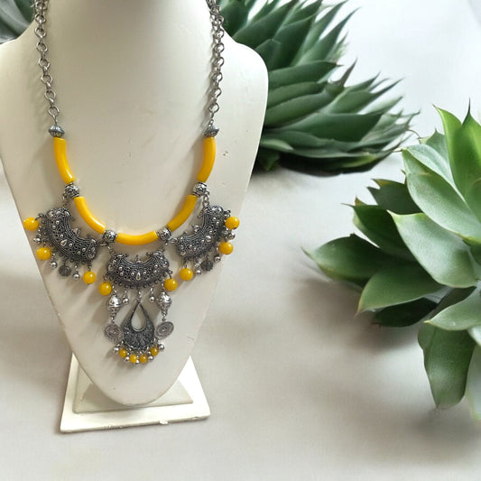 Exotic Indian style necklace with yellow beaded balls/tubes and ornate silver trim