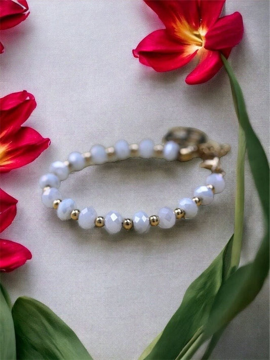 Vintage white faux crystal and goldtone beaded bracelet with unique charm