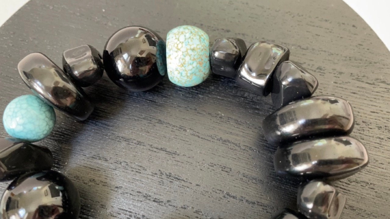 Stunning vintage mixed sizes and shapes of black and faux turquoise beaded bracelet