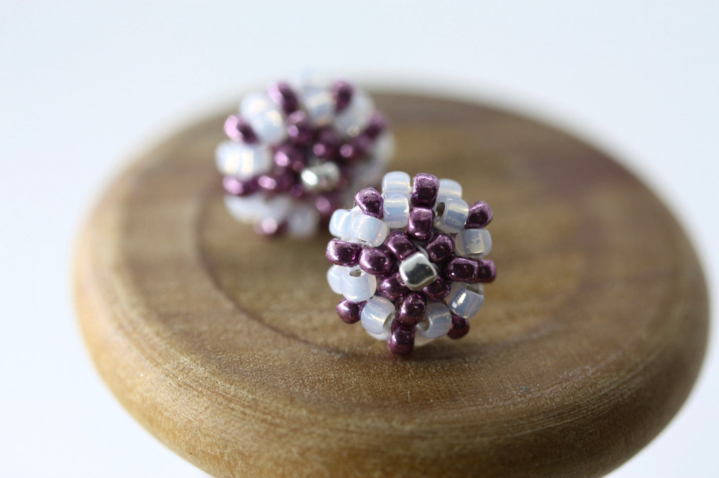 Hand beaded sterling silver stud earrings - purple with drops of gold lined white glass - studs, beadwork studs, beaded studs