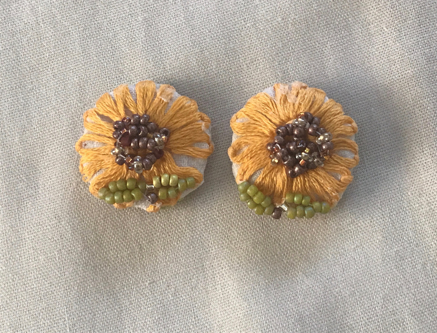 Upcycled sunflower earrings - embroidered flowers from vintage tablecloth surrounded by new, handmade beadwork - vintage and new materials