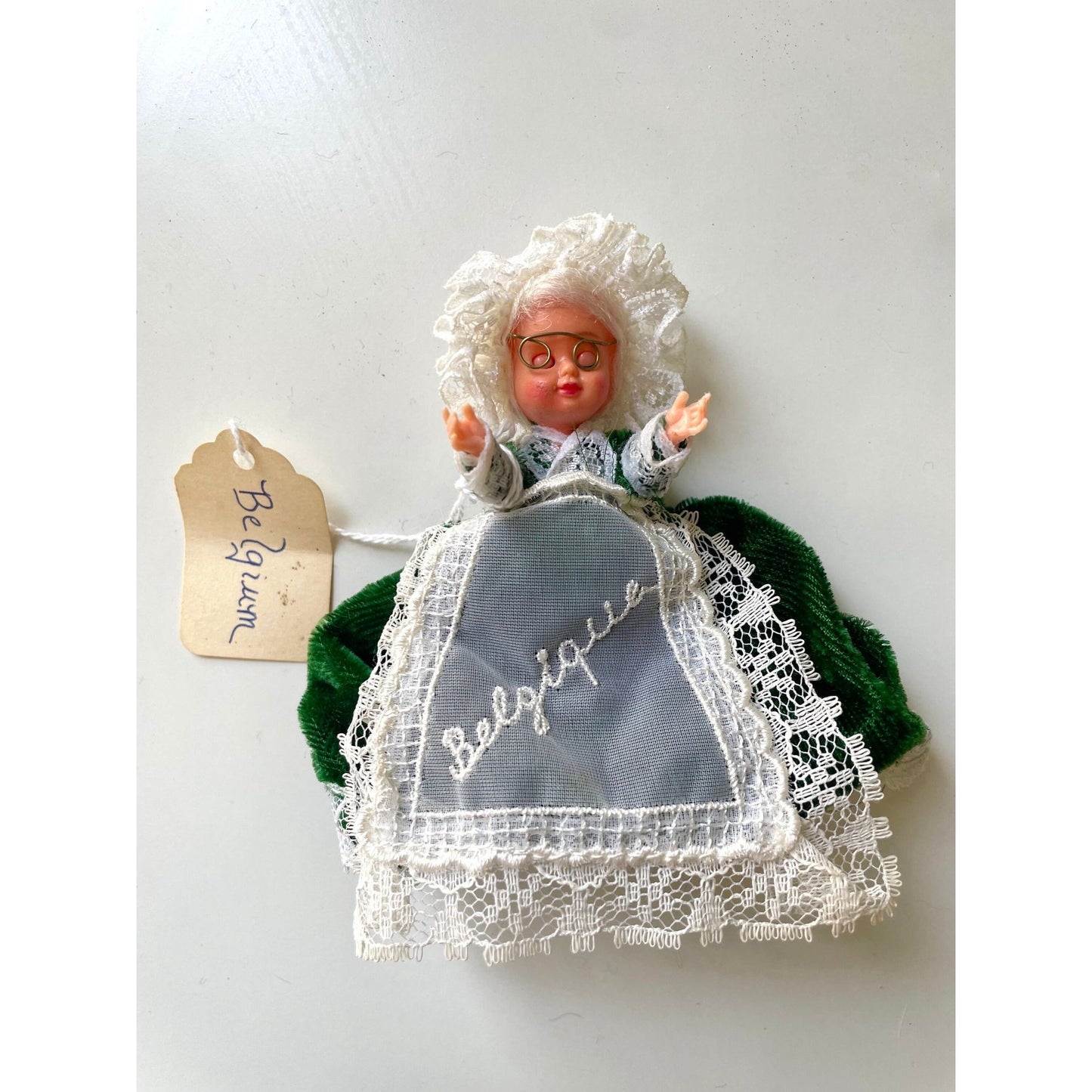 Stunning vintage collectible art baby Doll from Belgium with green velvet dress and lace overlay