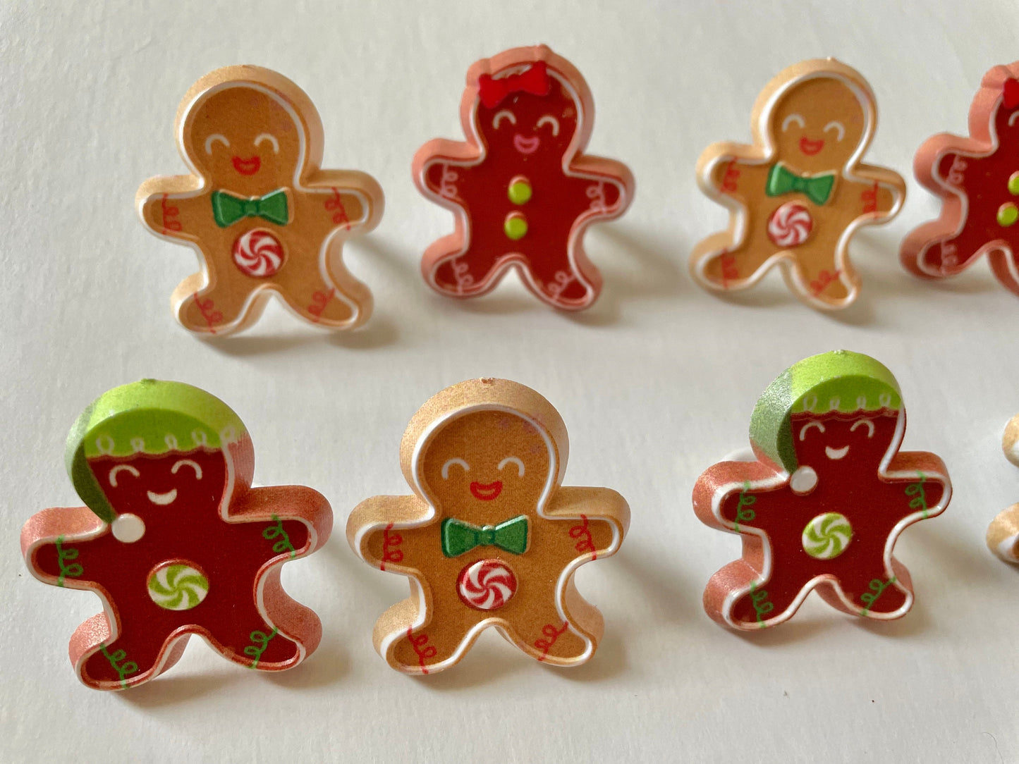 Mix of gingerbread men and women plastic ring cake toppers