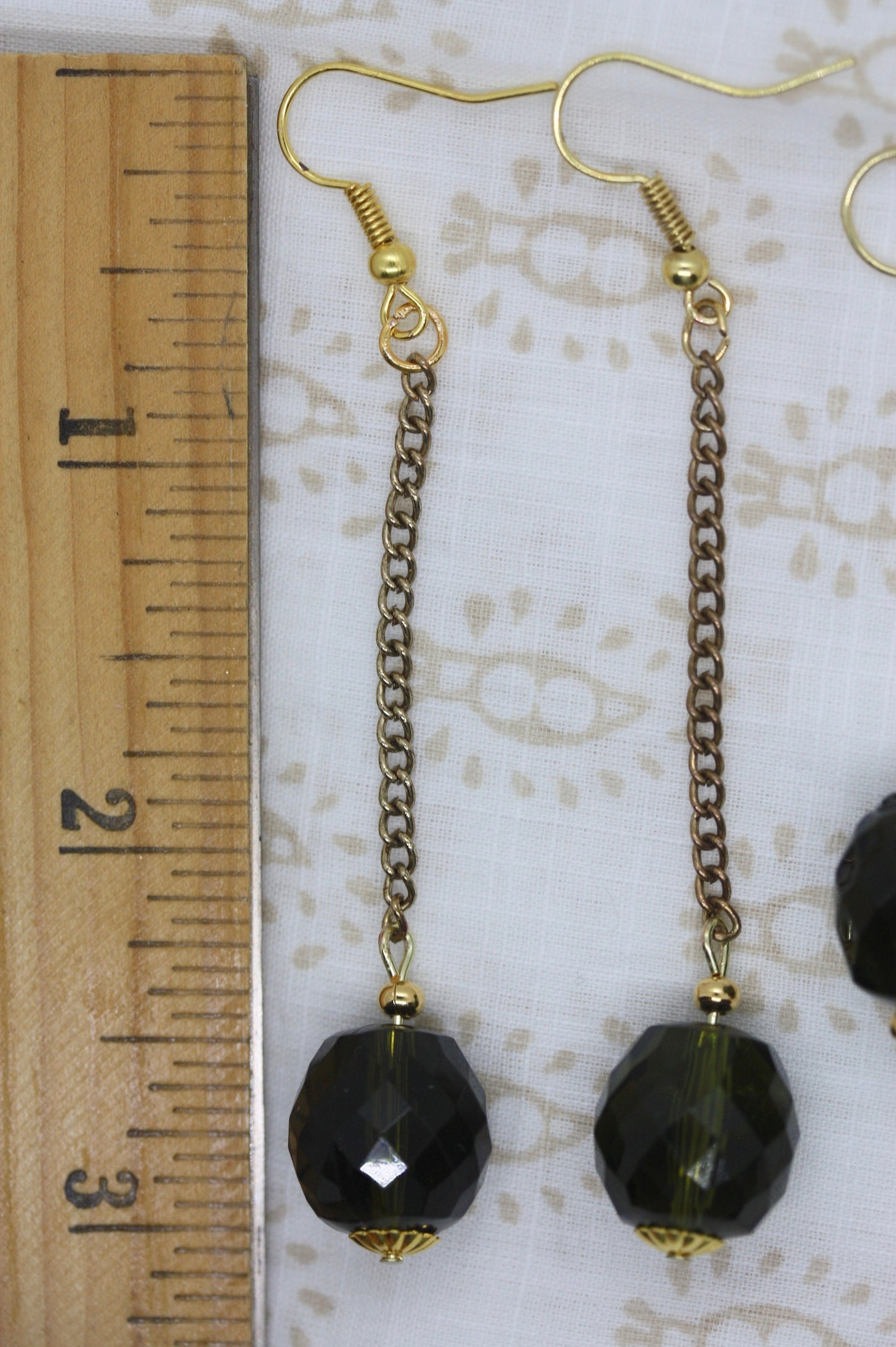 Your choice of faceted  green glass dangle earrings