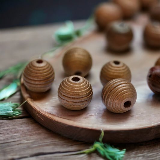 Large round ribbed (striped) copper colored vintage wood beads