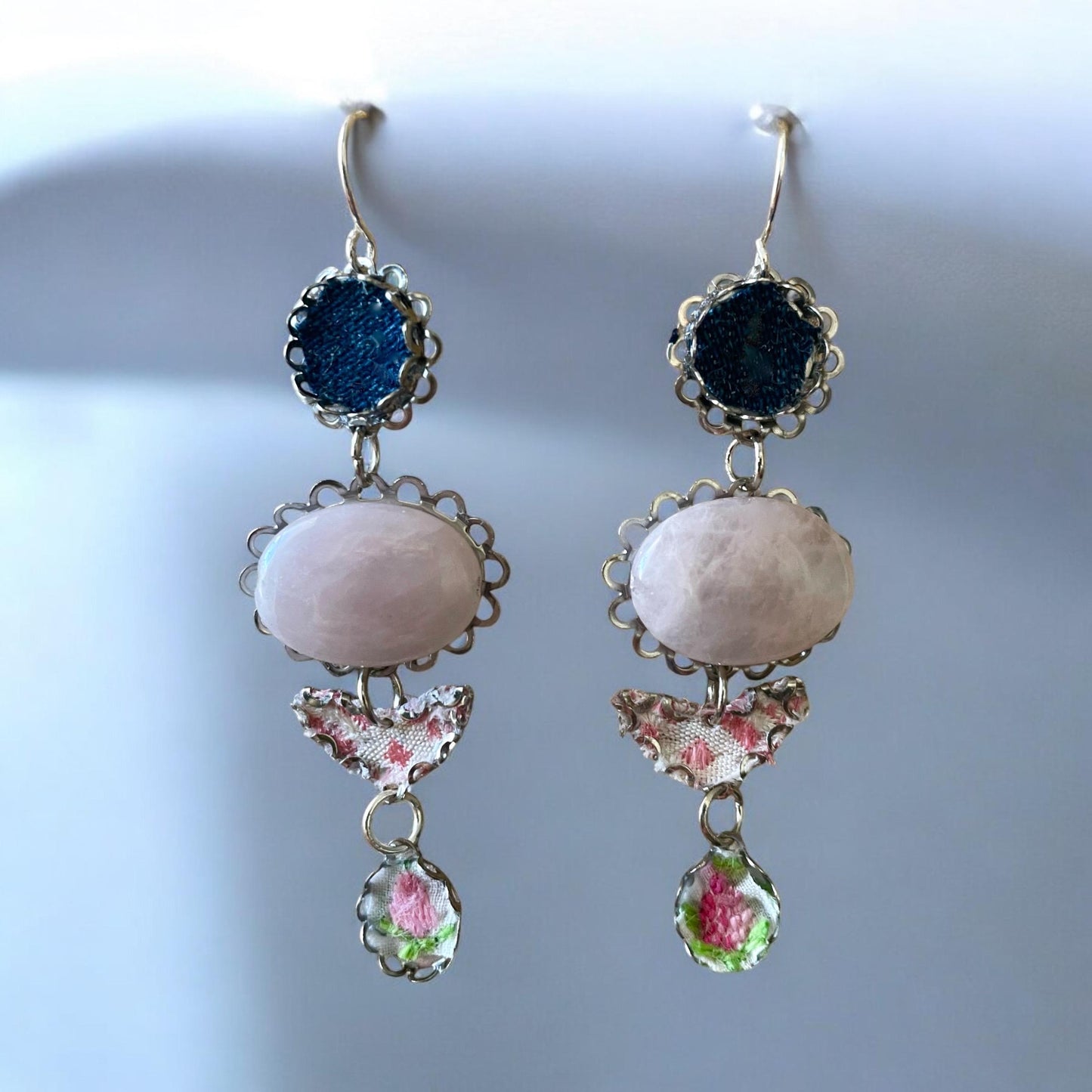 Handmade earrings featuring rose quartz, metal findings, denim, pink dotted fabric, embroidered flowers.  Sterling silver ear wires.