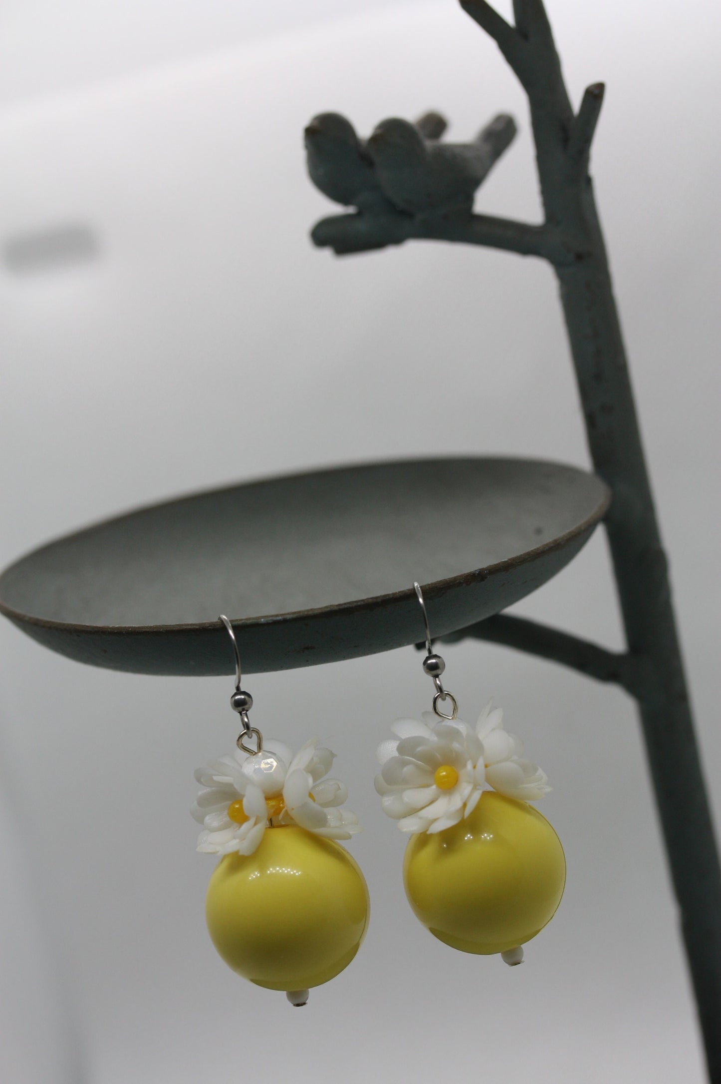 Bring the happy into your day with these flowery happy earrings