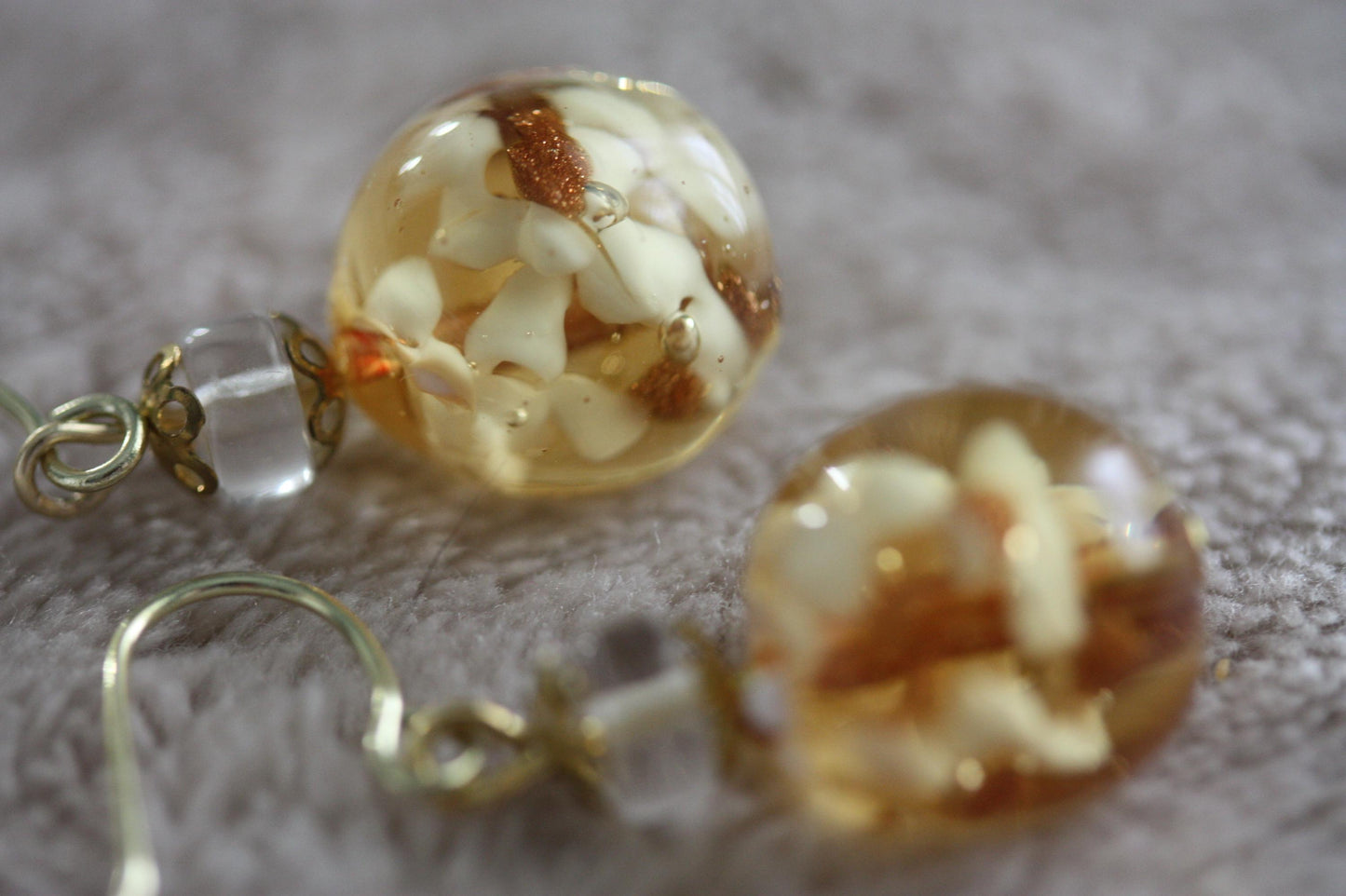 Stunning yellow and gold blown glass earrings with goldstone filigree - 1 and 1/4"