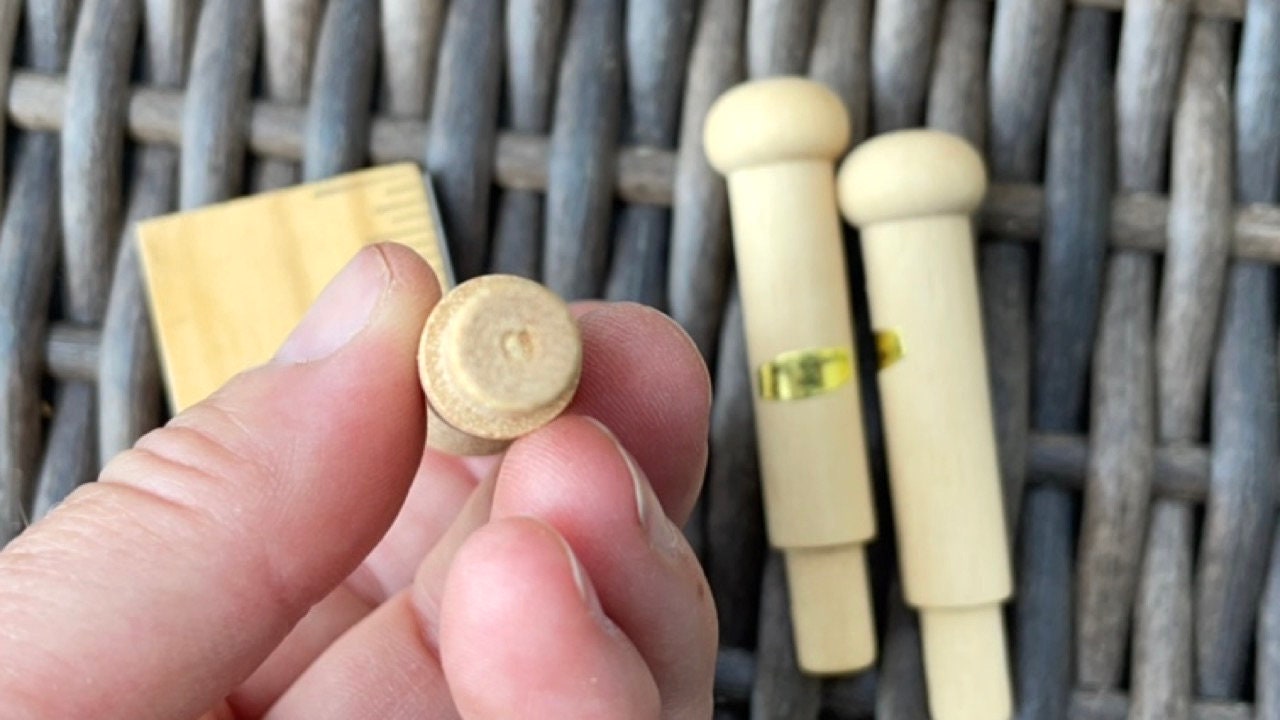 Unfinished solid wood pegs - great as craft supplies - for coat racks, doll making, wood sculptures, mixed material projects, etc.