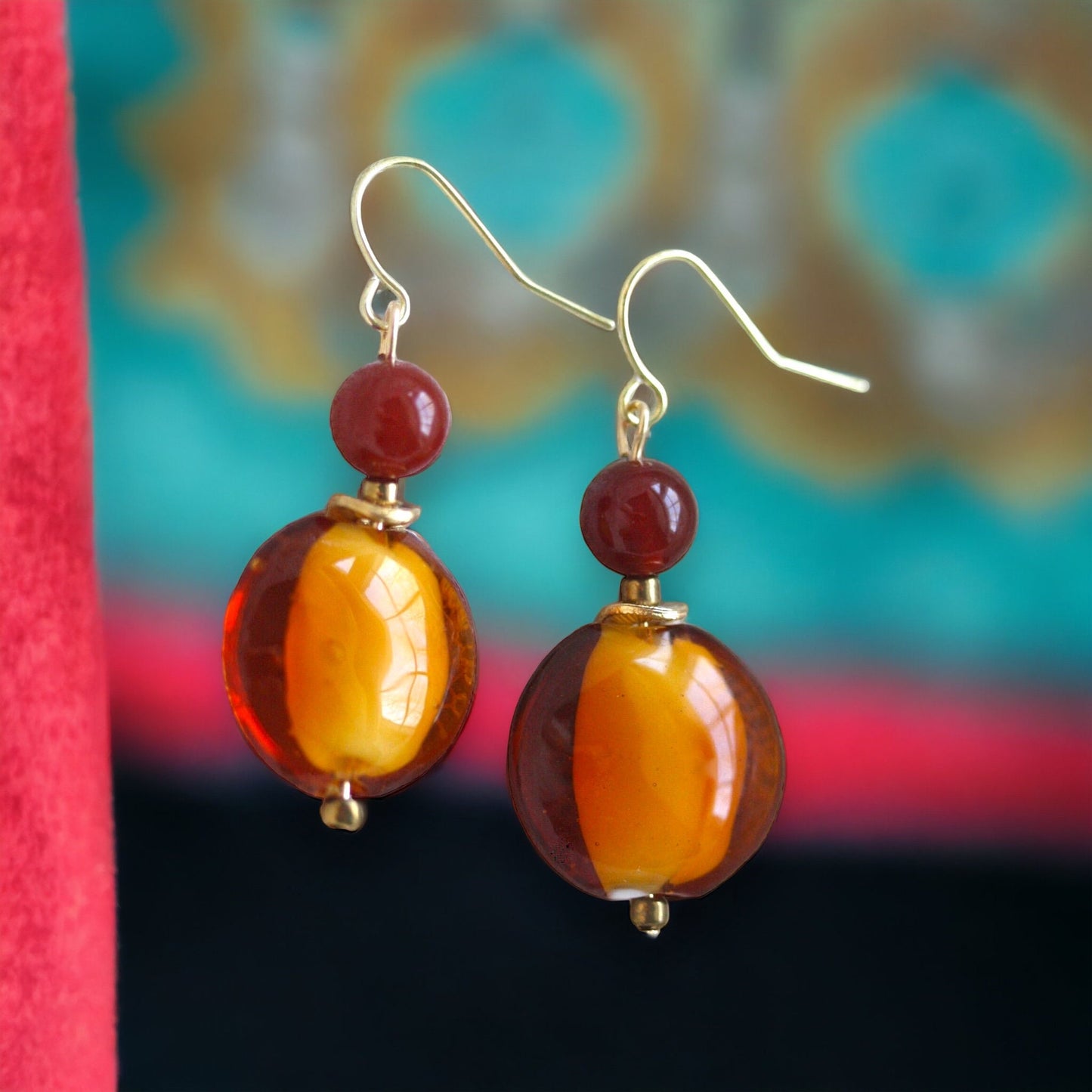 Orange and deep red dangle earrings