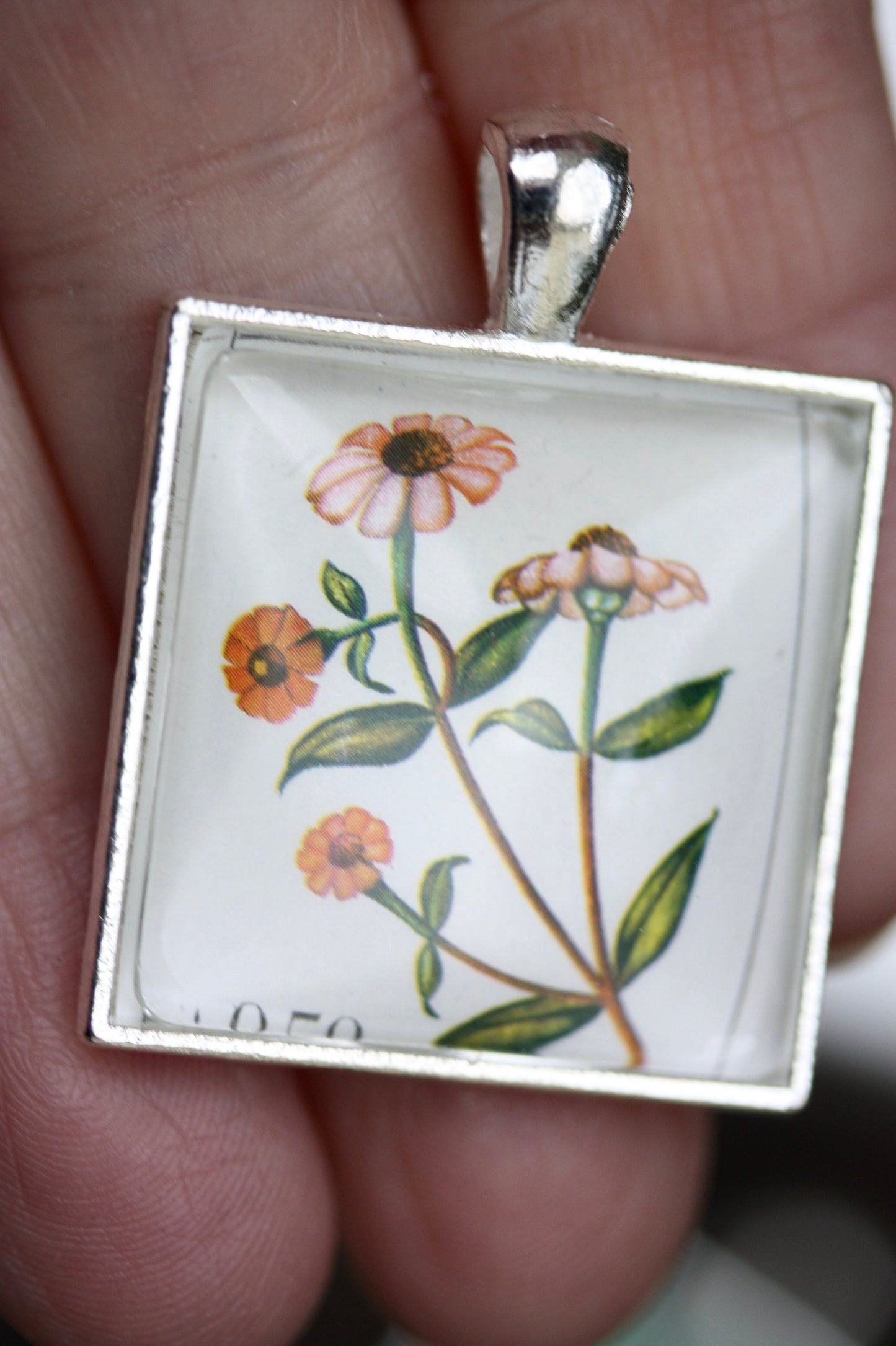 Necklace pendants made from genuine vintage and antique postage stamps from around the world - Australia, Argentina, Afghanistan, folk art