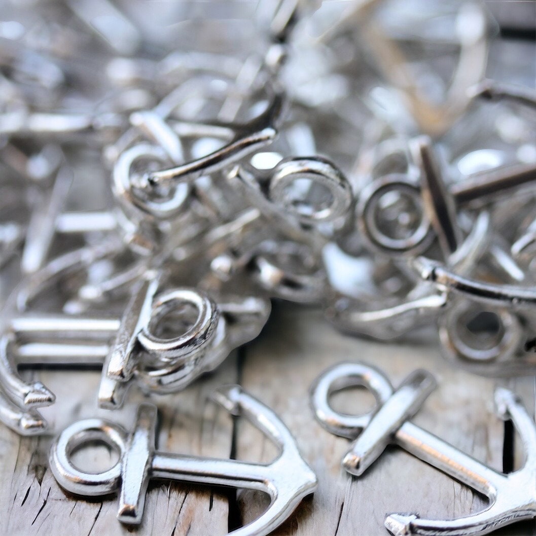 4 vintage boat anchor charms