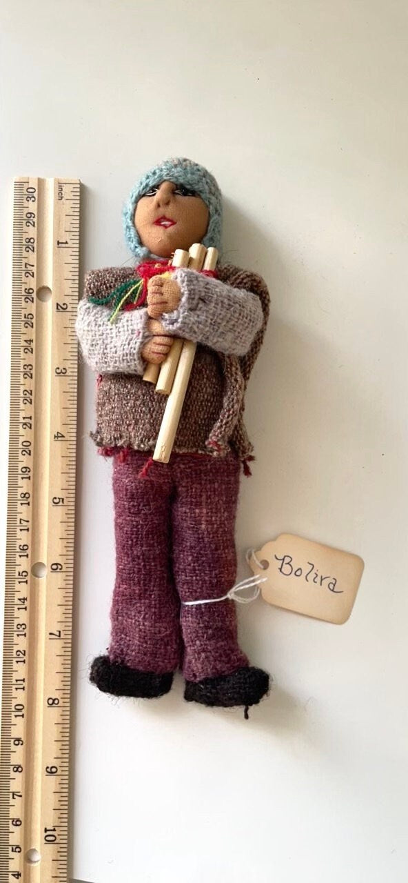 Vintage Bolivian man playing panpipes - collectible folk art doll with handmade woven wool clothing