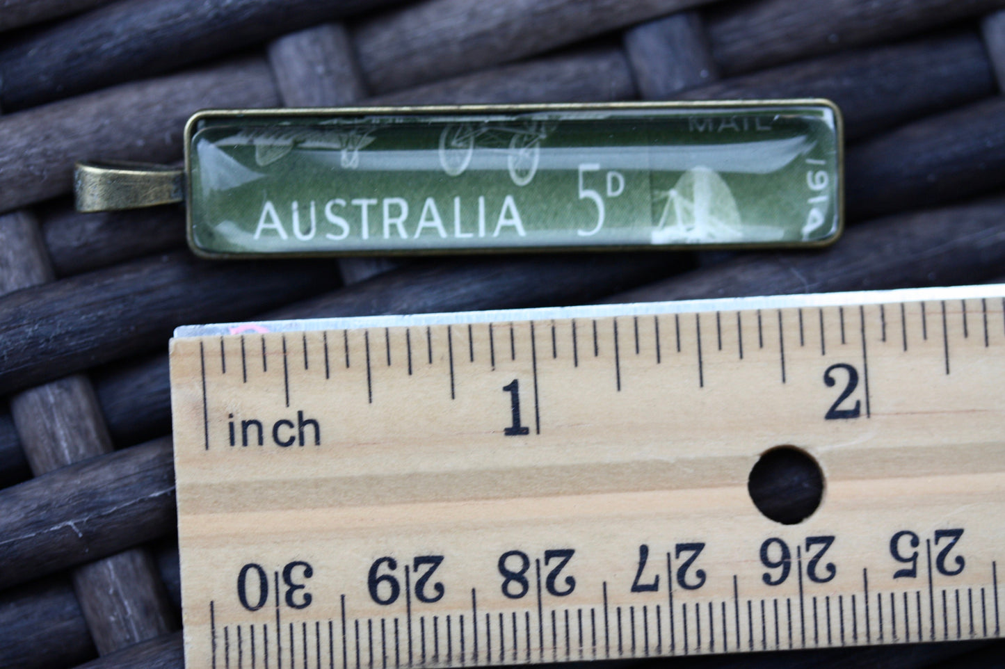 Necklace pendants made from genuine vintage and antique postage stamps from around the world - saints, Australian plane, Wicca  sun and moon