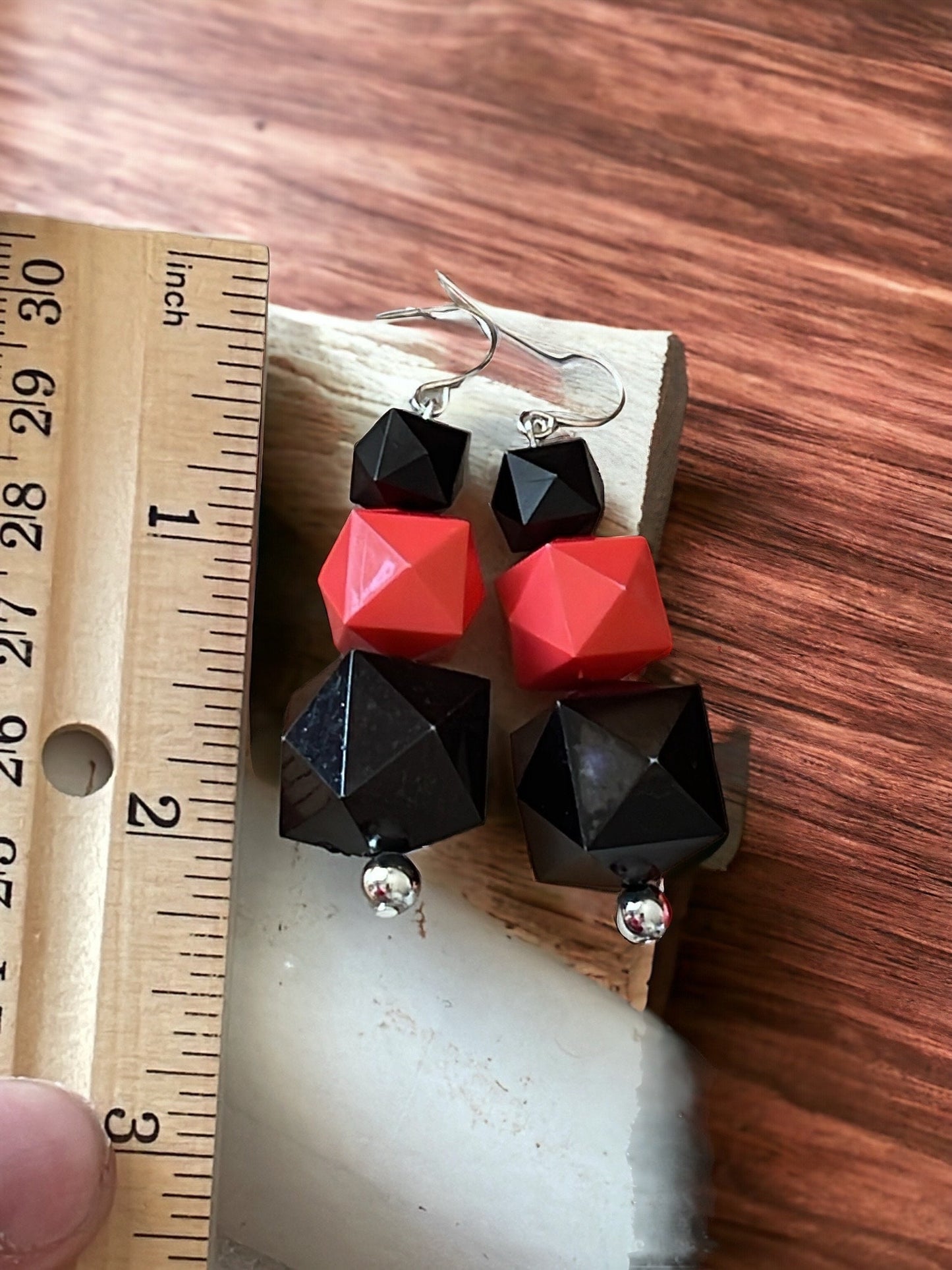 Your choice of coral or black faceted dangle earrings