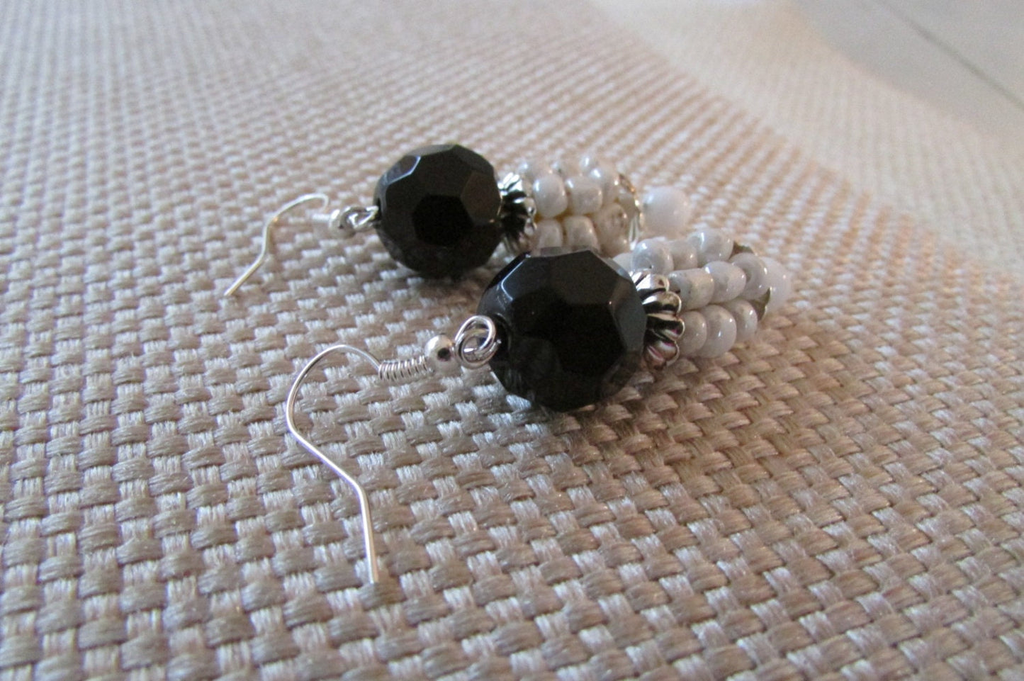 Black and white beaded dangle earrings