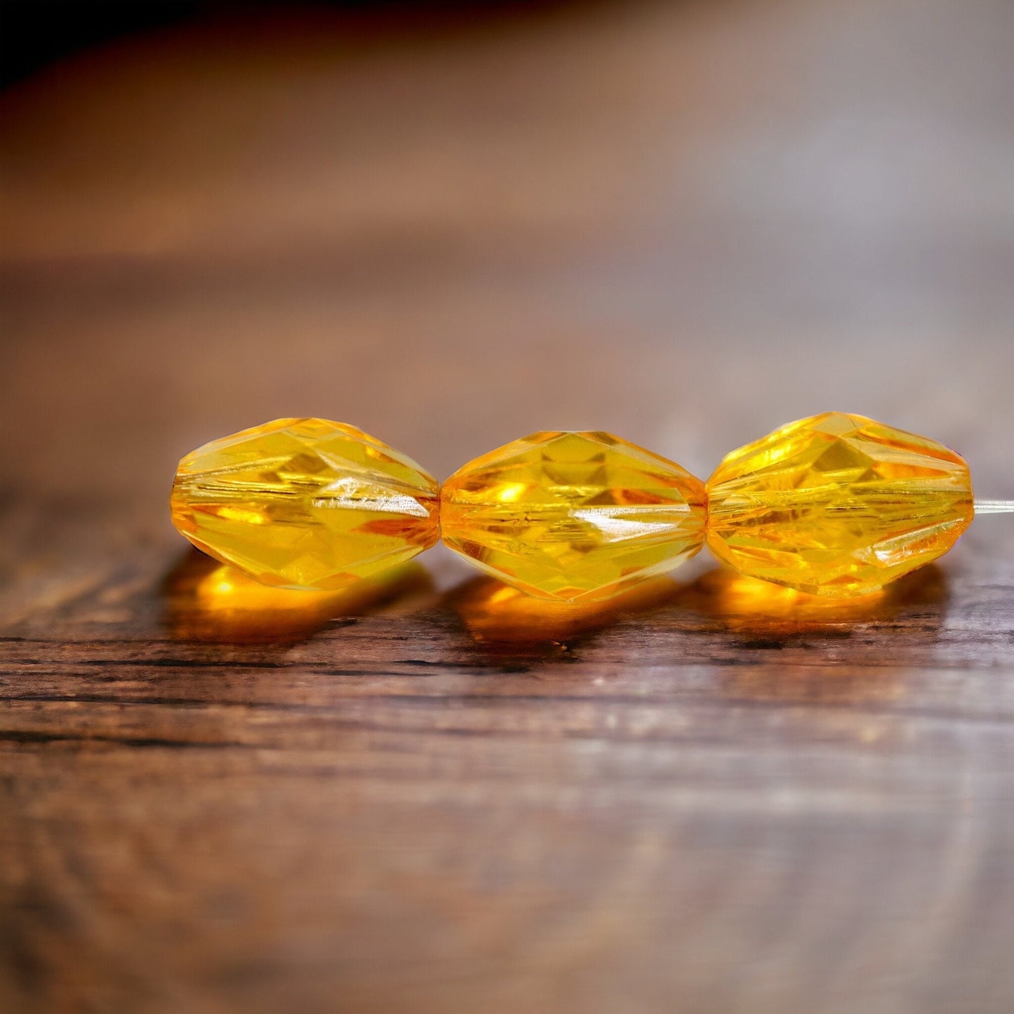 Orange oval faceted vintage beads - approx. 15 mm