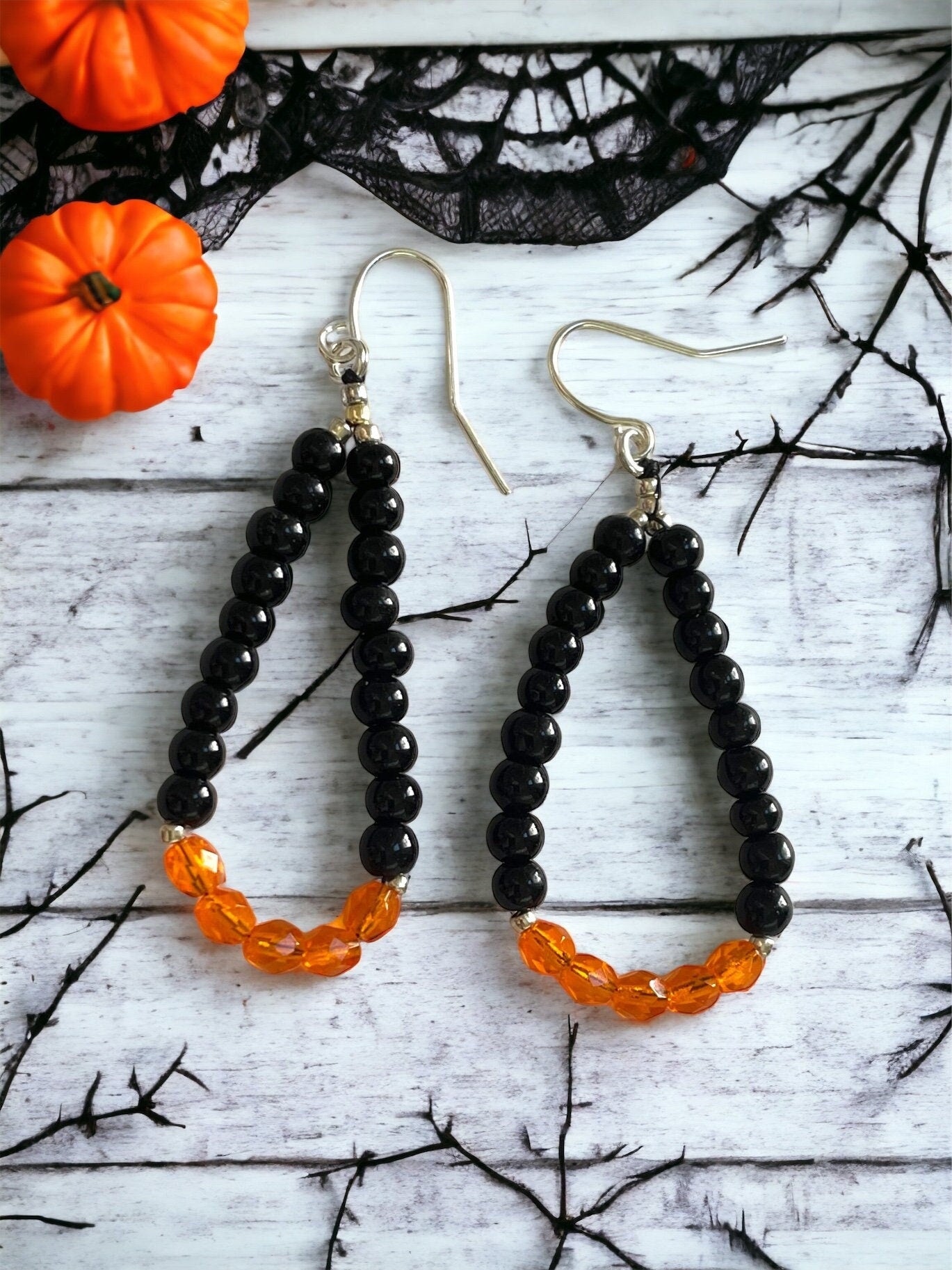 Hand beaded color block dangle hoop earrings - orange and black glass beads - perfect for the fall and Halloween