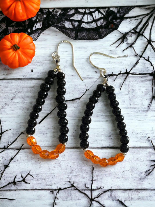 Hand beaded color block dangle hoop earrings - orange and black glass beads - perfect for the fall and Halloween